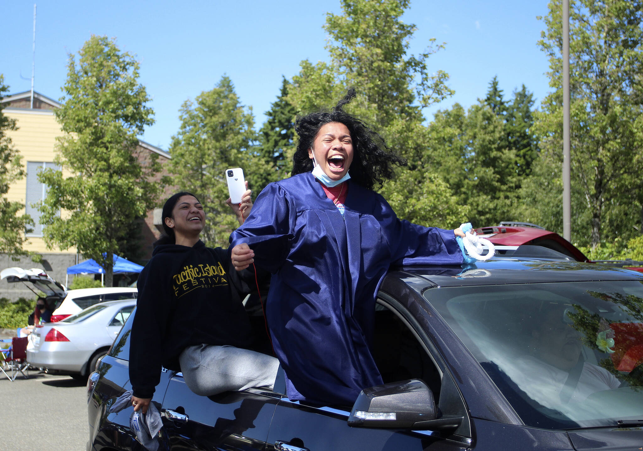 A Todd Beamer High School senior shouts in jubilation at the school’s car parade on June 9 leading into graduation weekend. Olivia Sullivan/the Mirror