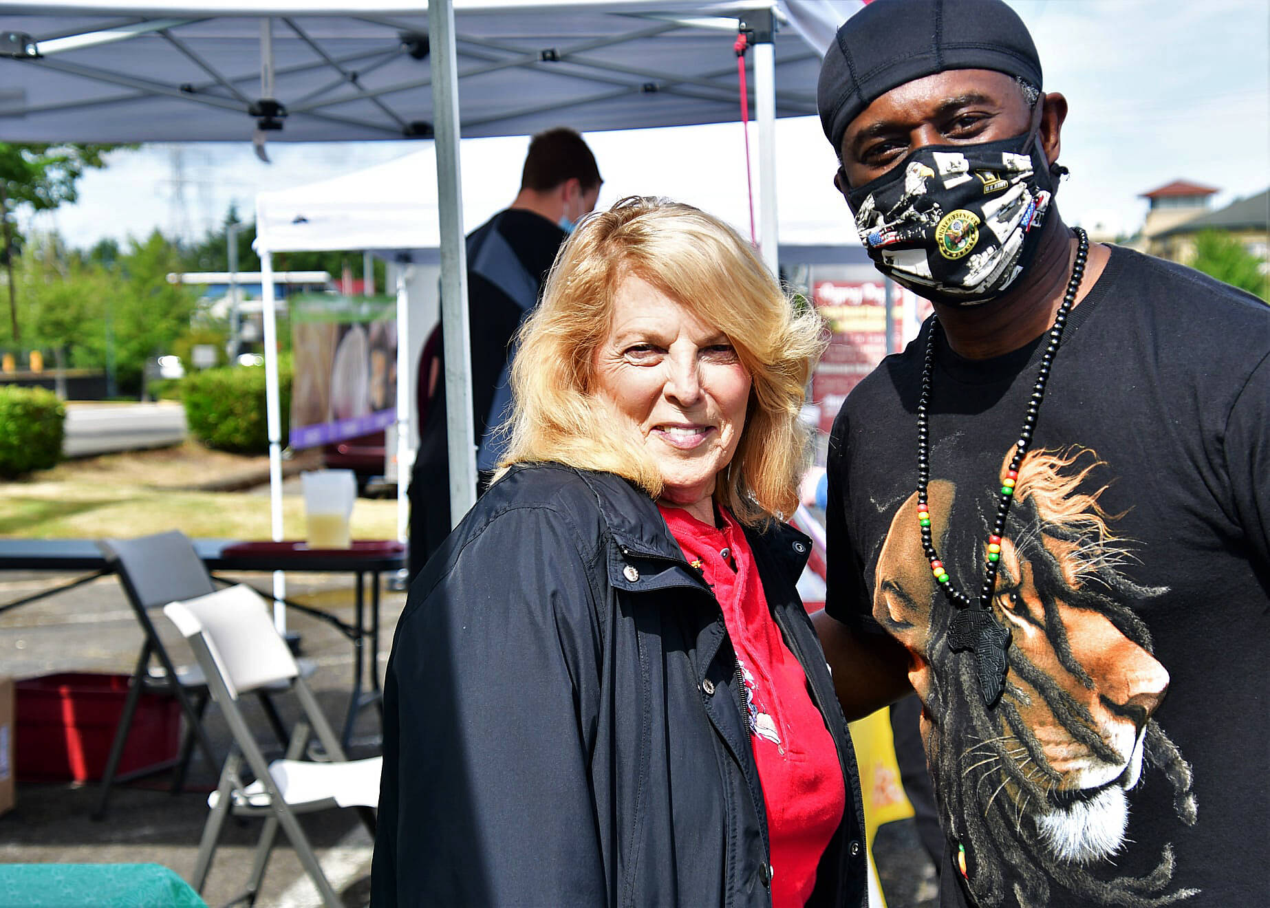 Photo courtesy of Bruce Honda
Rose Ehl, left, stands with Federal Way Farmers Market DJ LaMont Atkinson.