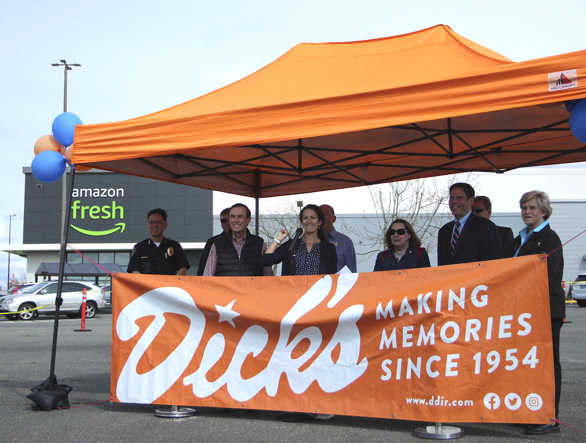 Dick’s Drive-In President Jasmine Donovan, center, speaks to the crowd during the location reveal celebration on April 28. She is joined by several local officials and business leaders. Olivia Sullivan/the Mirror