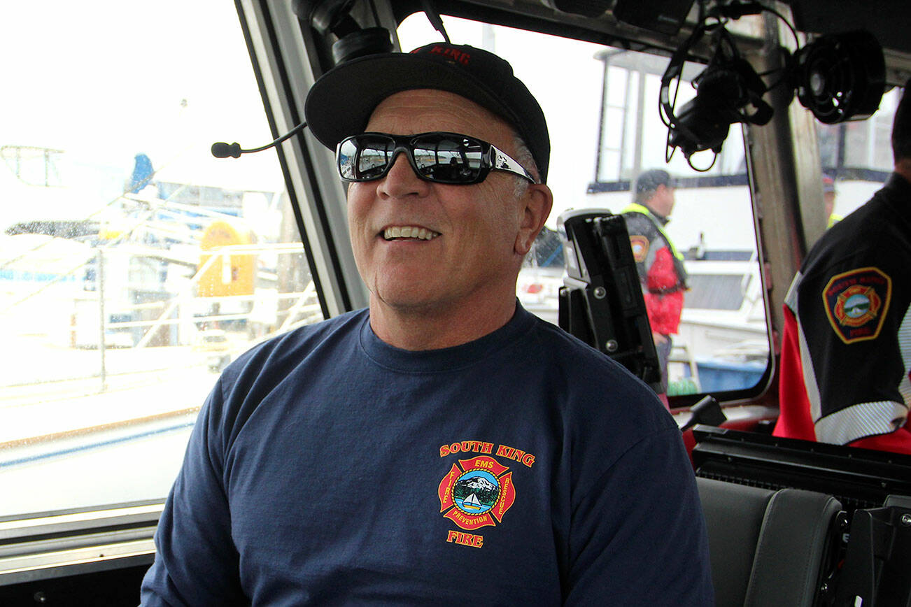 Driver Engineer John Fontana aboard Marine 367 on his final day with South King Fire. Olivia Sullivan/the Mirror