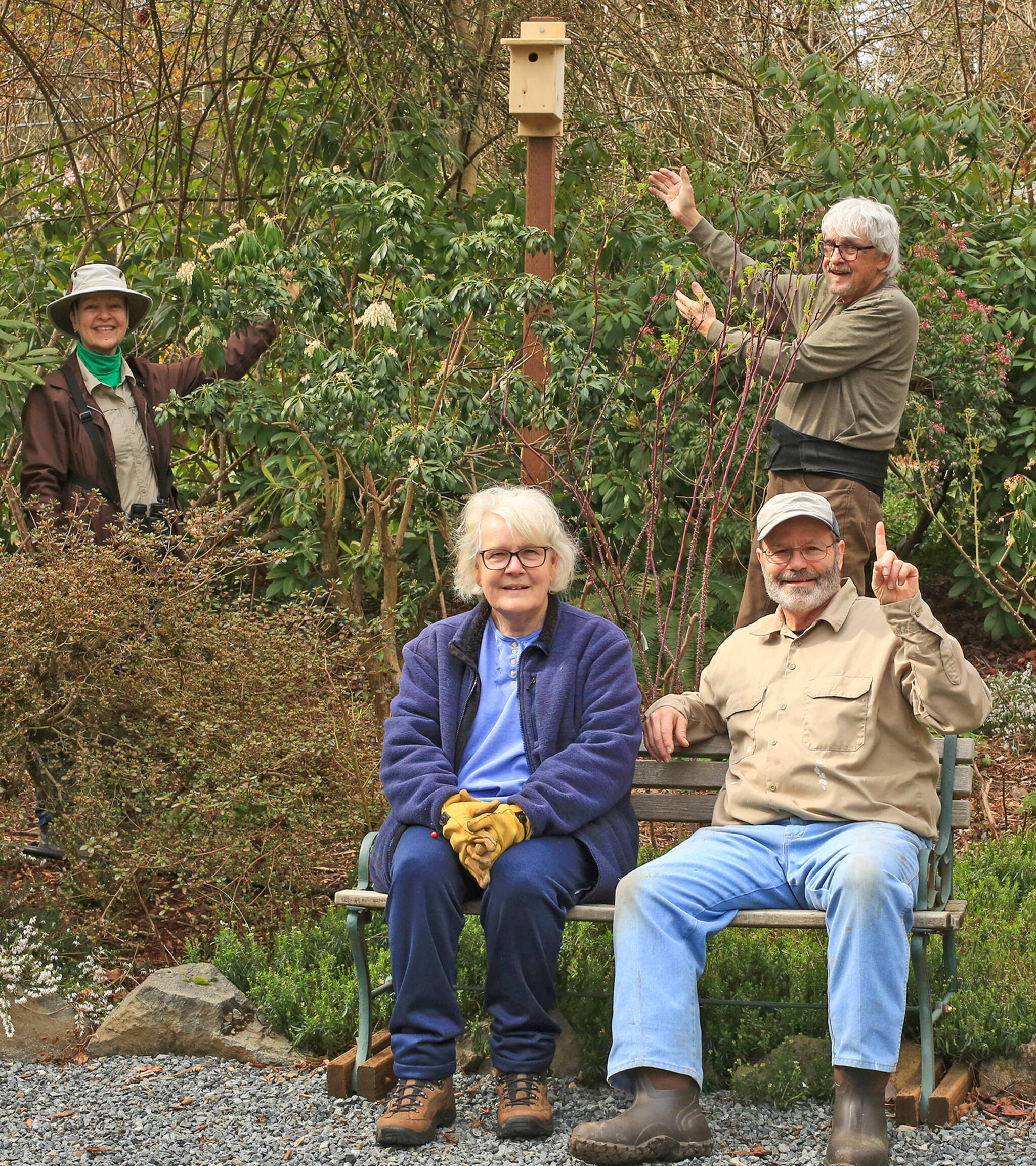 Linda Carlson (sitting, left), Ken Schroeder (sitting, right), Barbara Peterson (standing, left) and Jay Galvin (standing, right) of the Rainier Audubon Society pose in front of a nest box placed at Soos Creek Botanical Gardens. Photo courtesy of Jay Galvin.