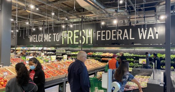 A sign in the produce section says “Welcome to Fresh Federal Way.” Olivia Sullivan/the Mirror