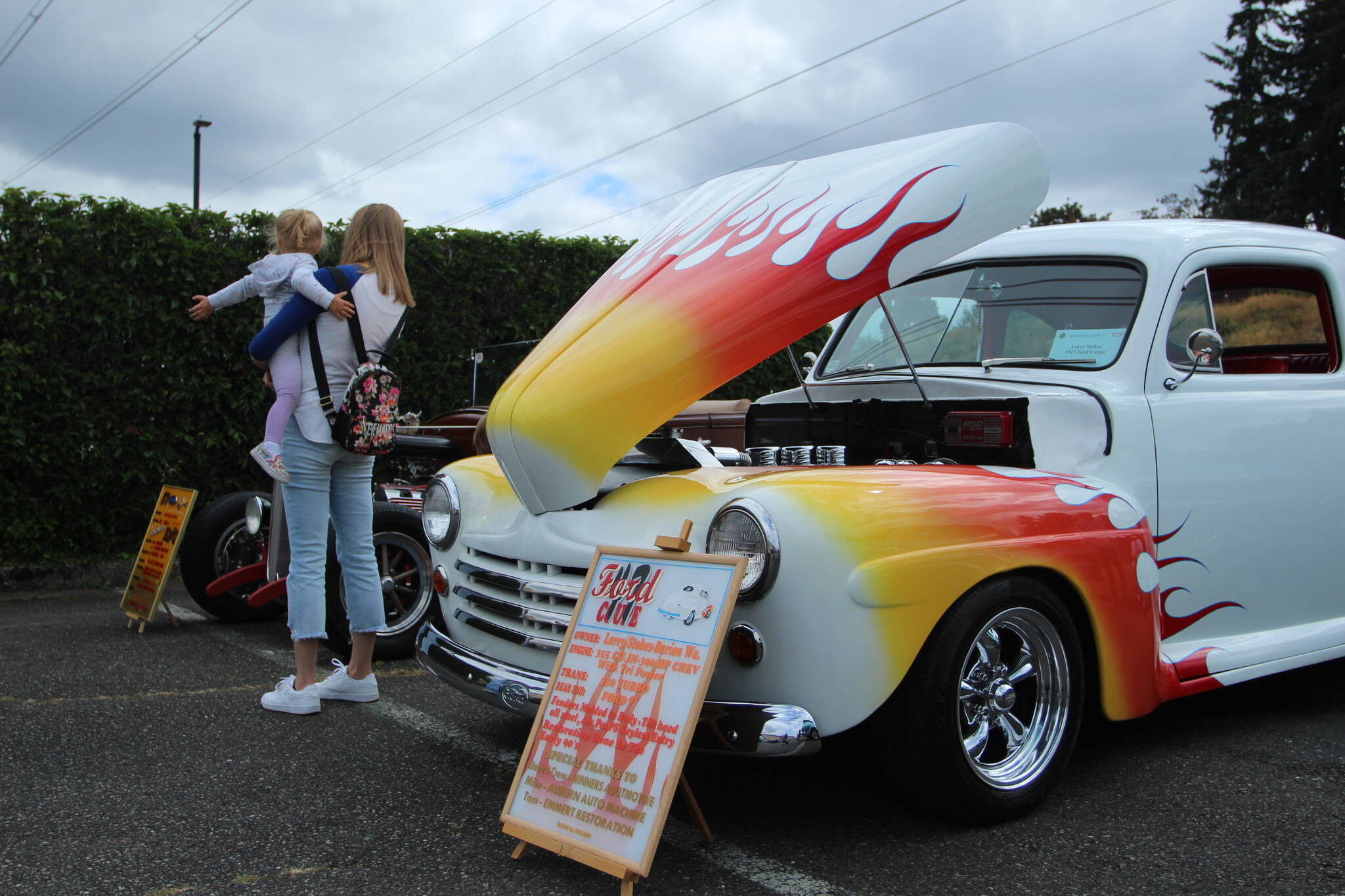 Attendees marvel at vintage cars on Aug. 27. Olivia Sullivan/the Mirror
