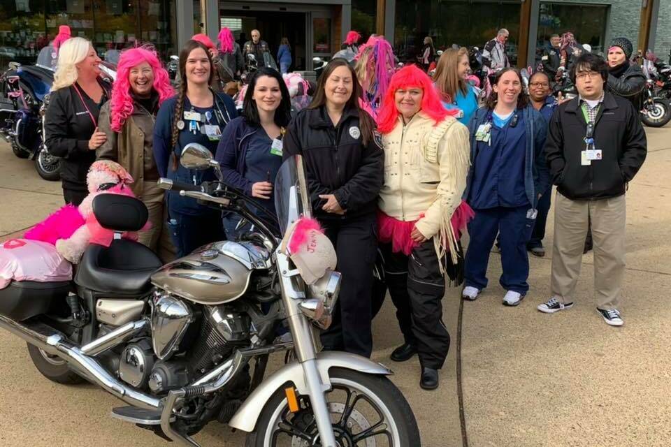 Riders from a previous Wigged Out Ride assemble at St. Anthony Hospital in Gig Harbor. Image courtesy Susan Scanlon.