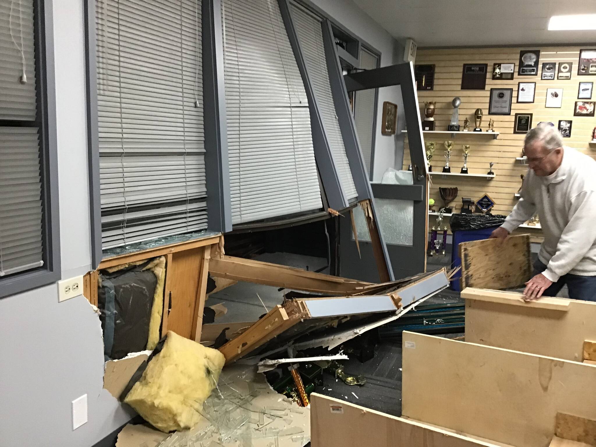 The front entrance to DJ Trophy, Awards & Engraving is heavily damaged after a suspect rammed a truck into the building and stole several items on Sept. 30. Photo courtesy of Jan Pool