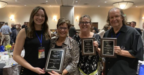 From left, Assistant Editor Olivia Sullivan, Federal Way Mirror Sales Manager Cindy Ducich, Advertising Director Carol Greiling and the Kent Reporter’s Steve Hunter hold their General Excellence awards at the WNPA conference on Oct. 8. Terry Ward/Sound Publishing
