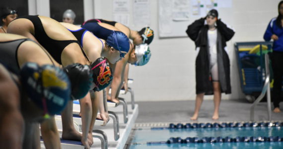 Photo by Ben Ray/Sound Publishing
Swimmers line up for the 400 Yard Freestyle Relay at the All City Meet inside the King County Aquatic Center.