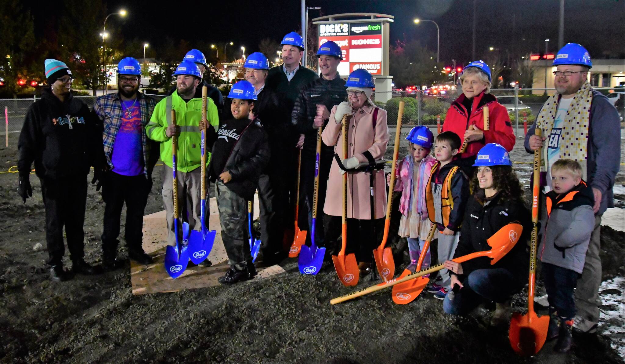 Photo by Bruce Honda
Elected officials, project leaders, community members and President Jasmine Donovan, kneeling in front, prepare to break ground on Nov. 3.
