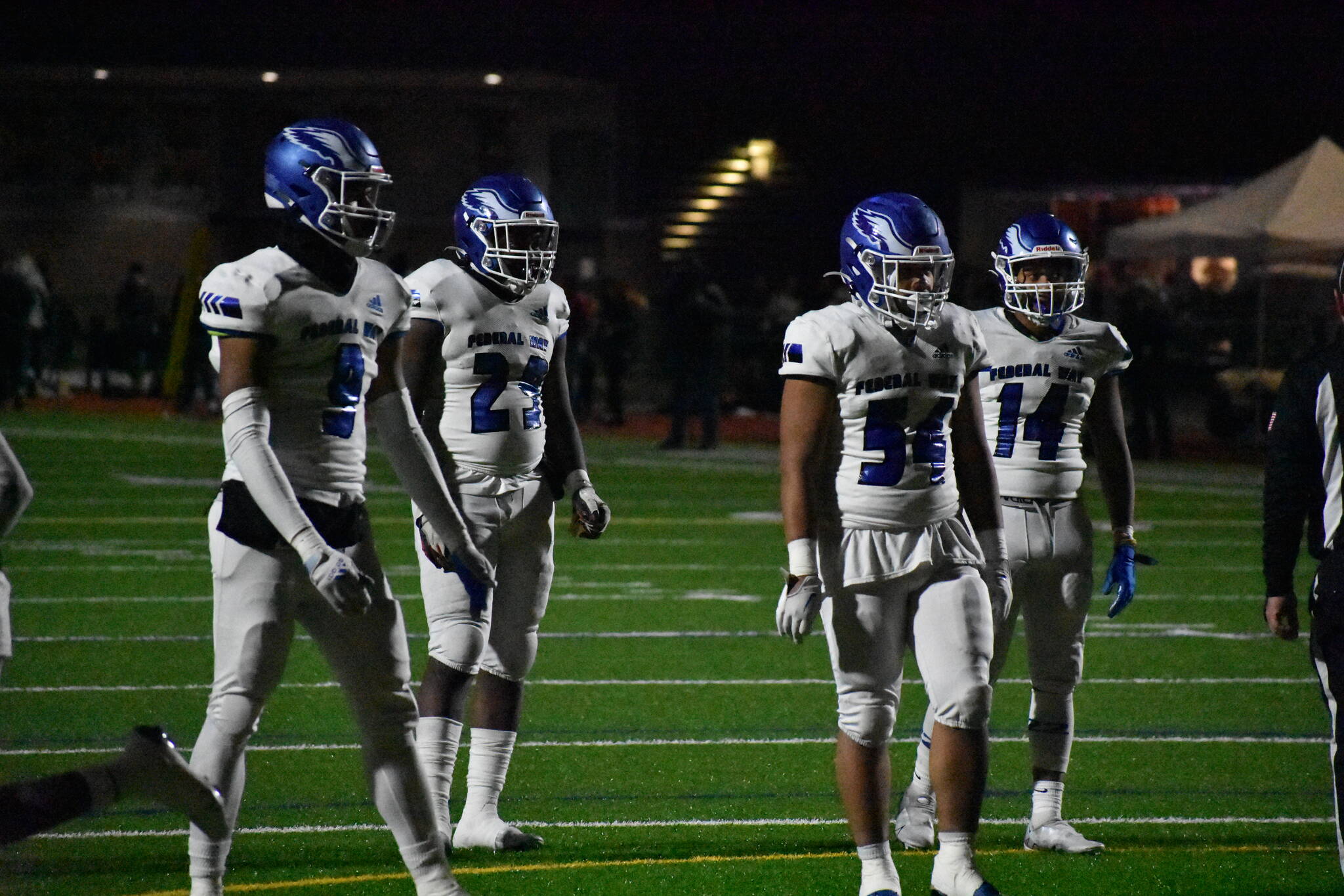 The Eagles defense looking to slow down the Spartans deep in their own end. Pictured: Tylin Jackson, Maki Piper, Khyse Faletogo, Keshawn Pham-Roberts. Photo by Ben Ray/the Mirror