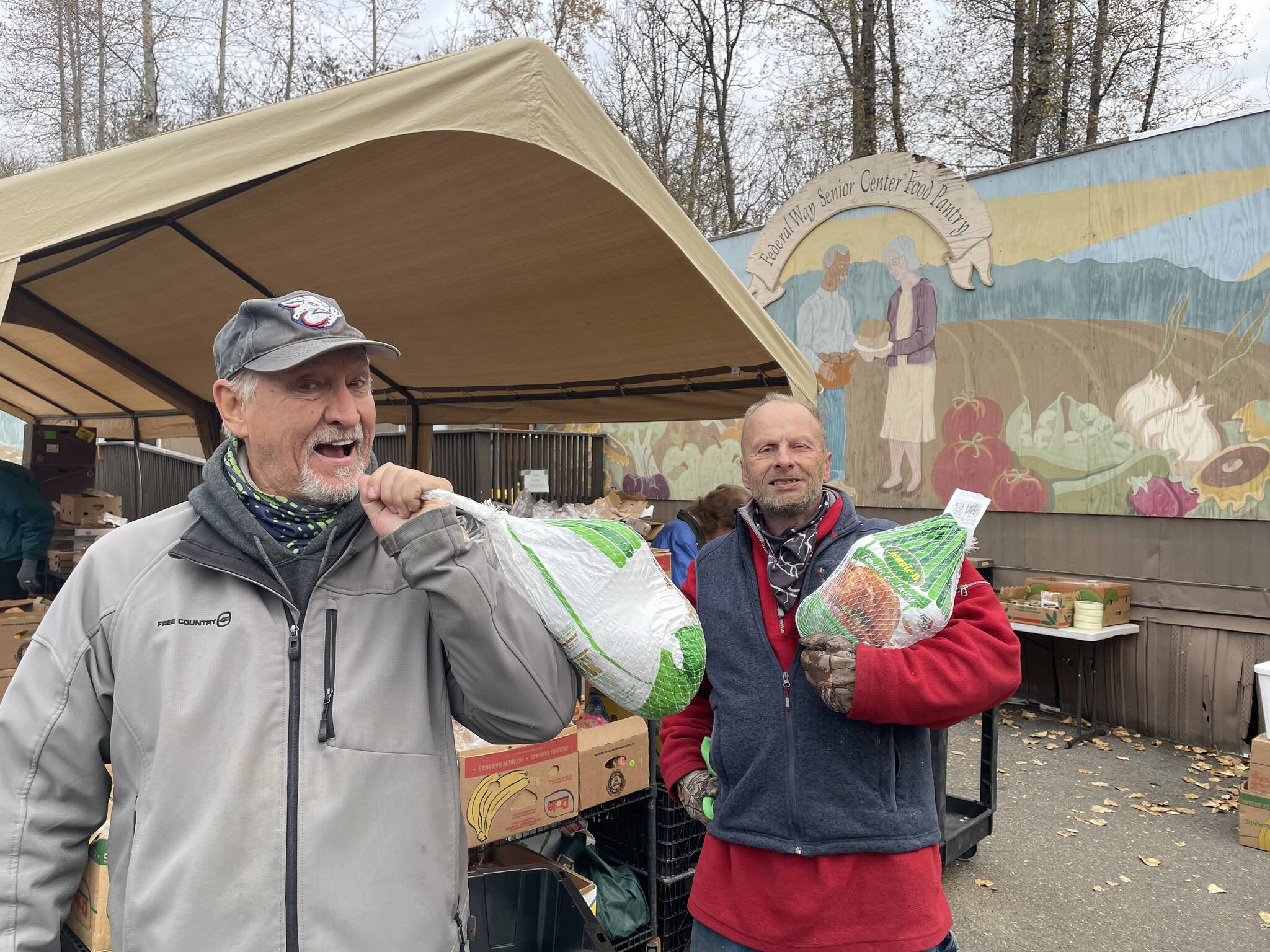 Volunteers help hand out Thanksgiving turkeys on Nov. 21. Photo courtesy of Shelley Pauls