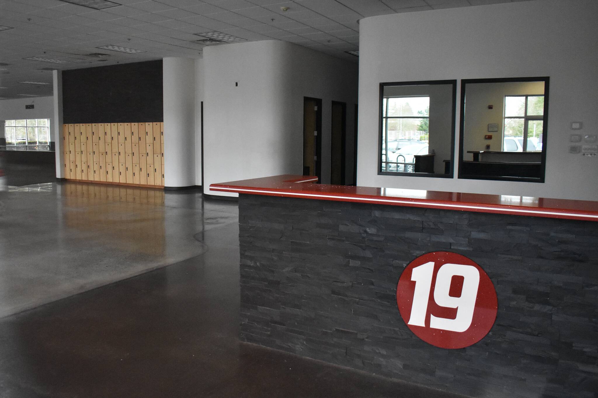Inside Fitness 19, all that is left is the lockers and the company’s logo desk as of November. Ben Ray/the Mirror