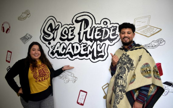 Photo by Alex Bruell/the Mirror
Sí se Puede Program Manager Elsa Alvarado and student support advocate Emmanuel Lopez pose for a picture by the entrance of the program’s new home near where 16th Avenue South meets Highway 99 in Federal Way. Sí se Puede is operated by El Centro de la Raza and aims to help young people get their GED and on track toward meaningful careers.