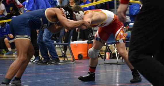 DHS Kenny Popp wrestling the eventual champion at 138 pounds from TJ, Kayle Bearson. Ben Ray/the Mirror
