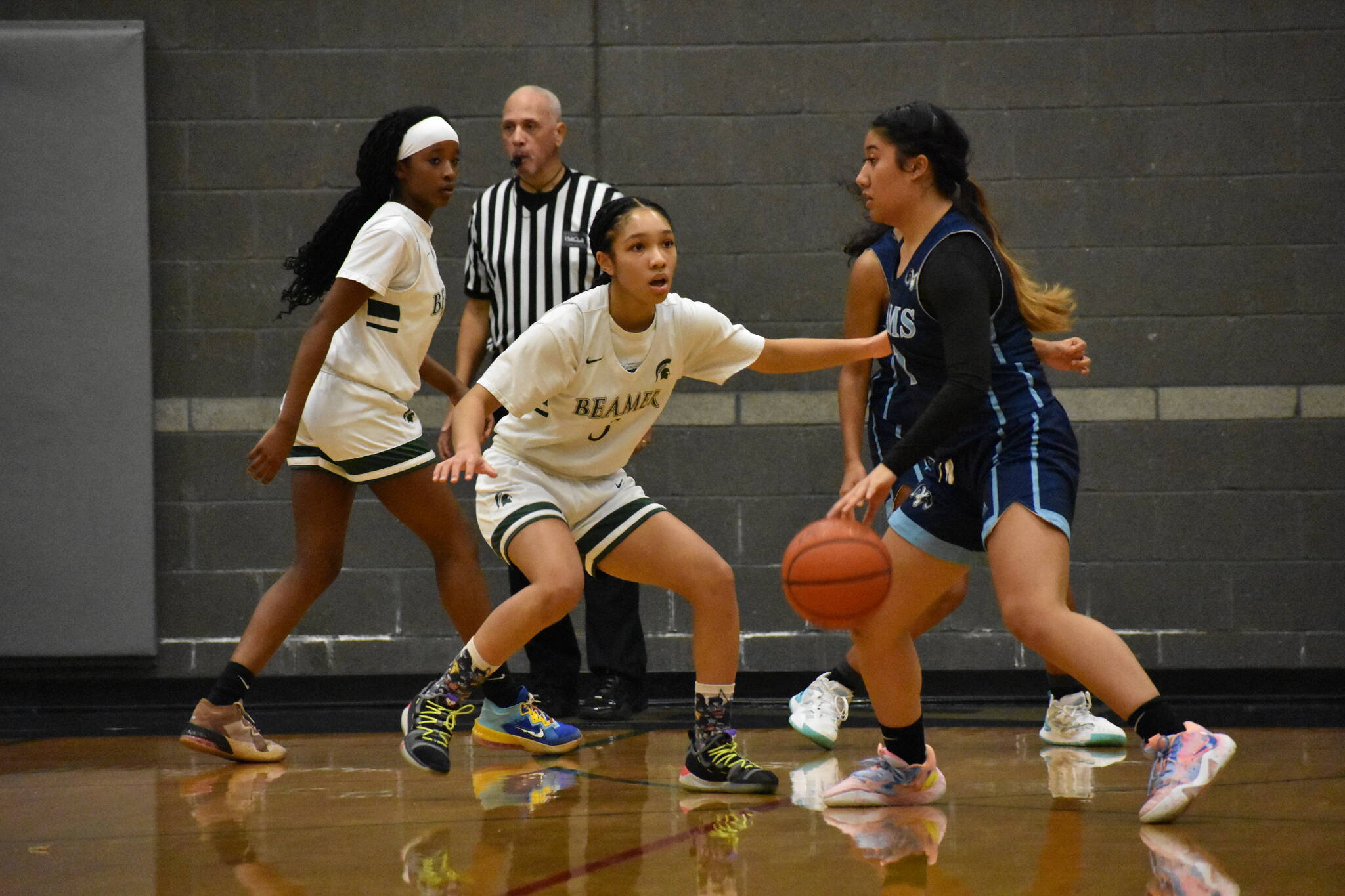 Todd Beamer guard Aaliyah Chappell locks down the Mount Rainier ball handler in the first quarter.