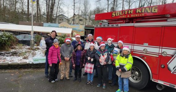SKFR members bring donations for the Federal Way Senior Center Food Bank on Dec. 19. Photo courtesy of South King Fire and Rescue