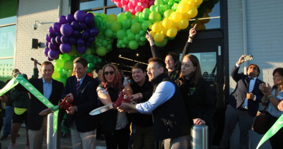City officials and Amazon Fresh staff help cut the ribbon on opening day of the Amazon Fresh store. Olivia Sullivan/the Mirror