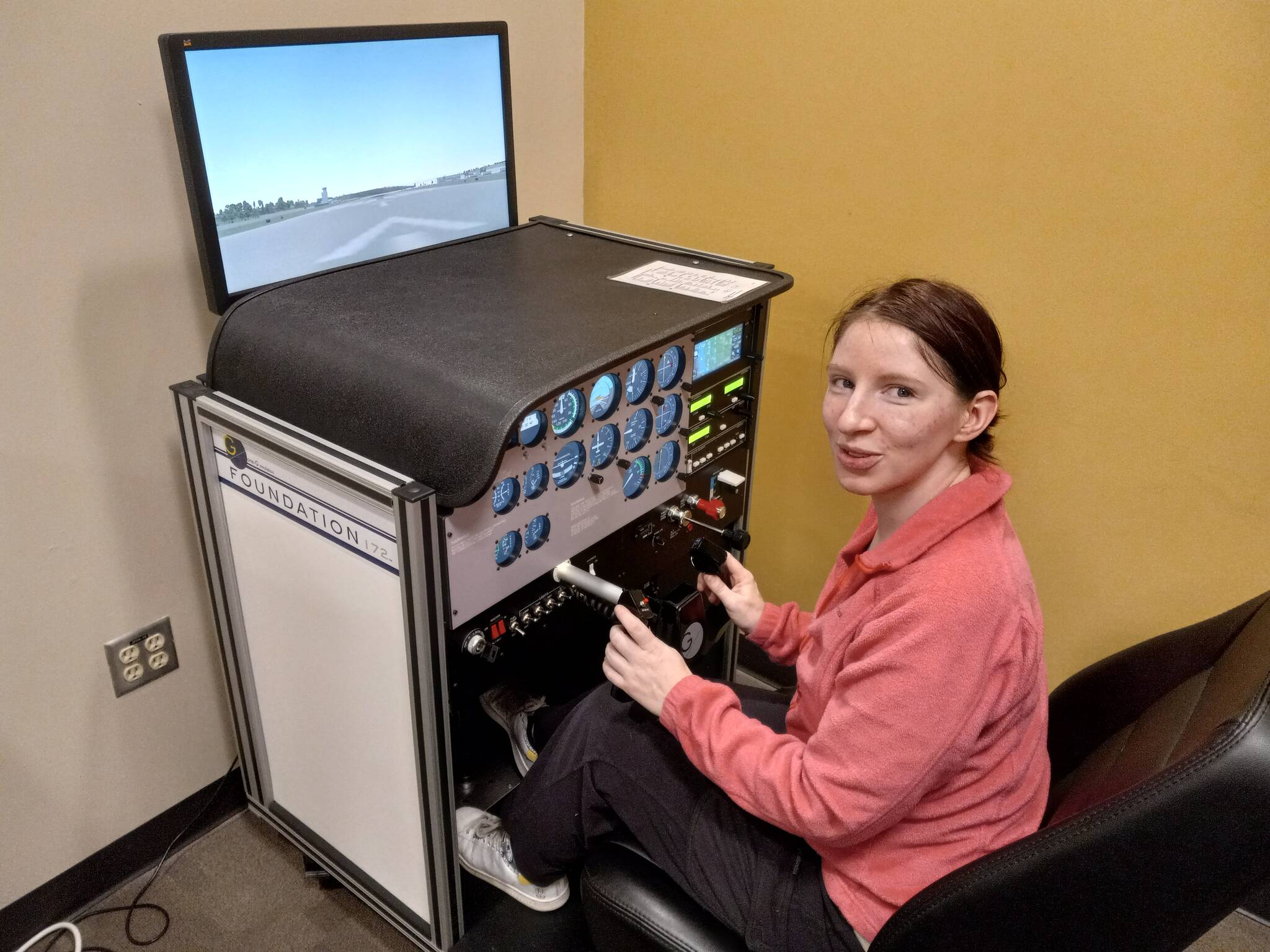 Photos by Robert Whale, Auburn Reporter
Colie Brooks at work learning how to integrate wing flaps into her landing procedure on a simulator at the GRC Aviation Center.