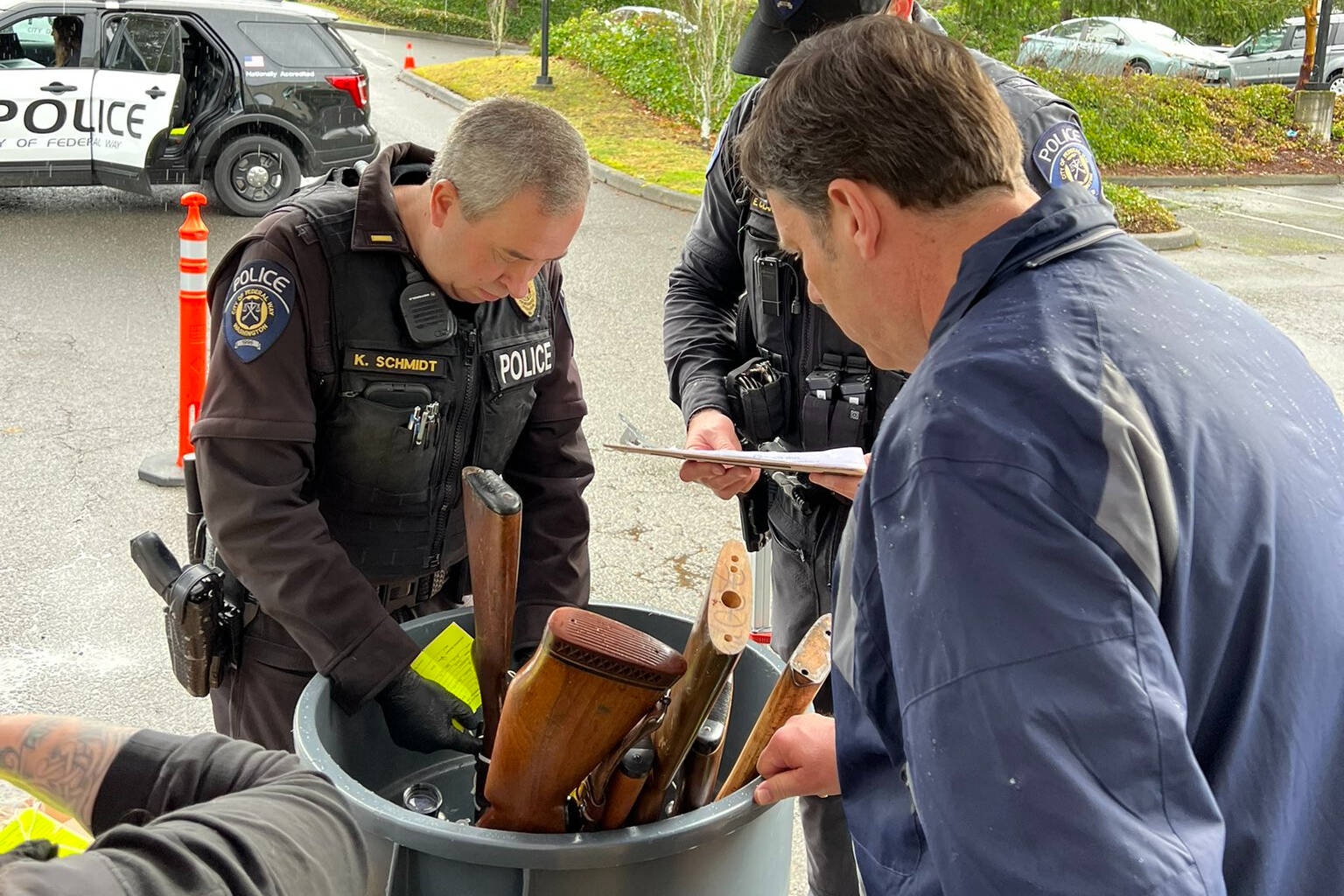 This photo, shared by Federal Way Mayor Jim Ferrell on Twitter, shows officers working at the Feb. 4 gun buy-back event in Federal Way.