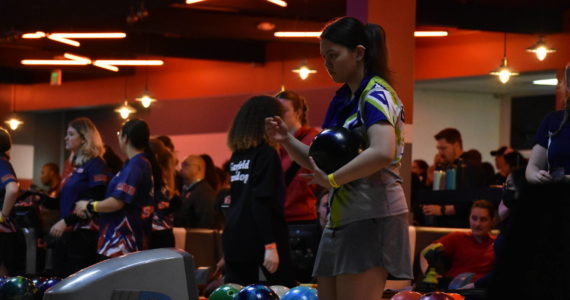 Todd Beamer senior Jazel Tuquia gages in before her next bowl at the state tournament.