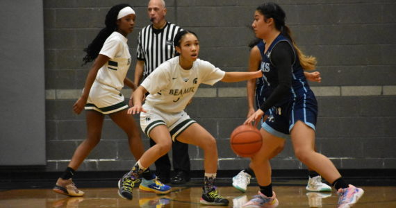 Aaliyah Chappel plays tough defense against Mt. Rainier. Photo Credit: Ben Ray/ The Mirror.