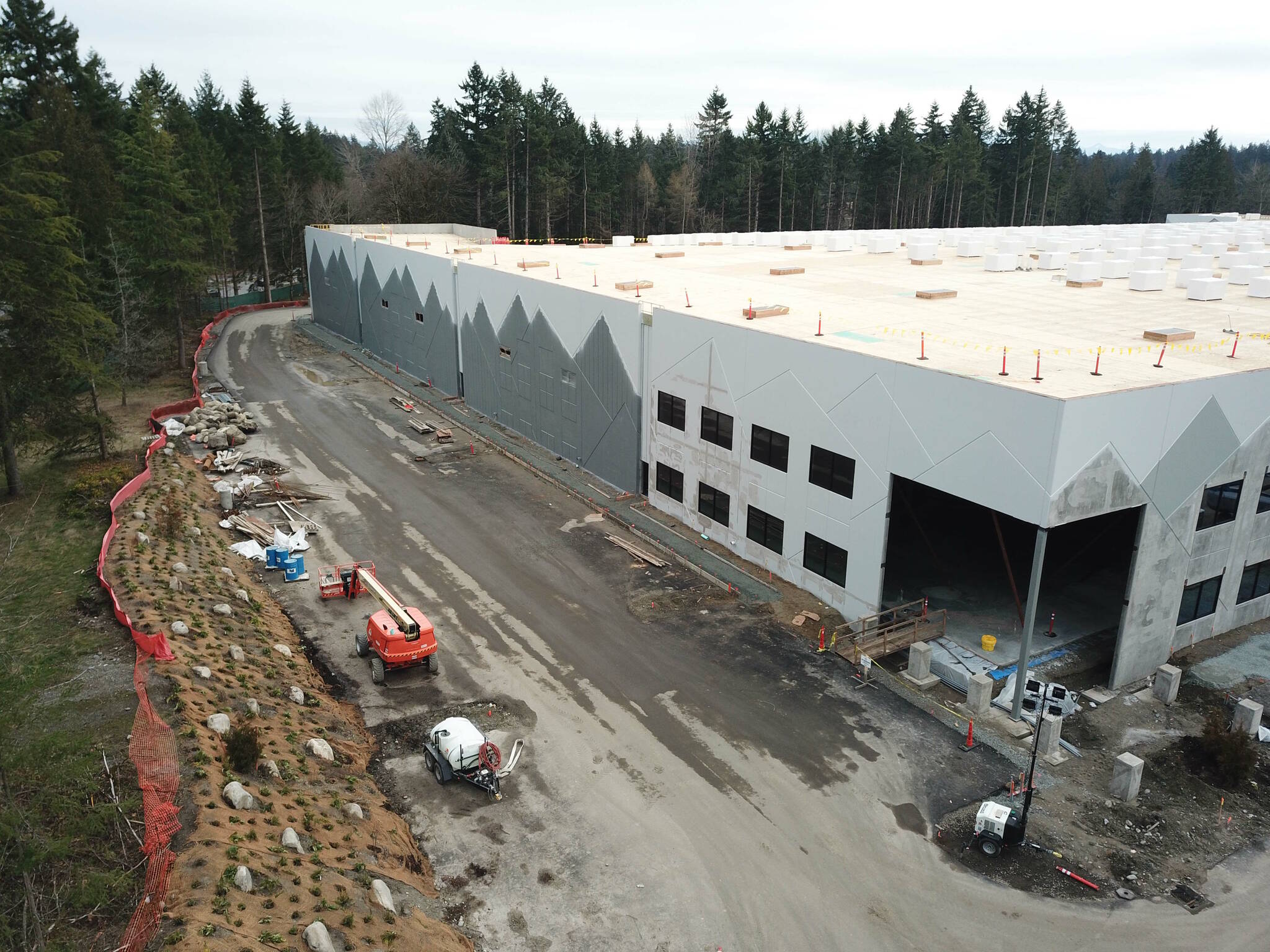 Photo by Bruce Honda
Buildings A and B of Woodbridge’s campus plan on the former Weyerhaeuser campus are projected to come online this year.