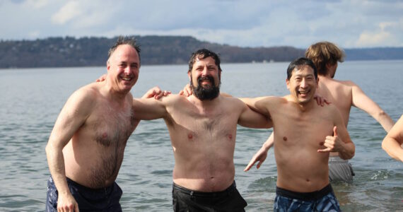 More than a dozen people plunged into the chilly waters of the Puget Sound on Saturday, March 10, for the Marine Hills Swim and Tennis Club Polar Bear Plunge. Alex Bruell / The Mirror
