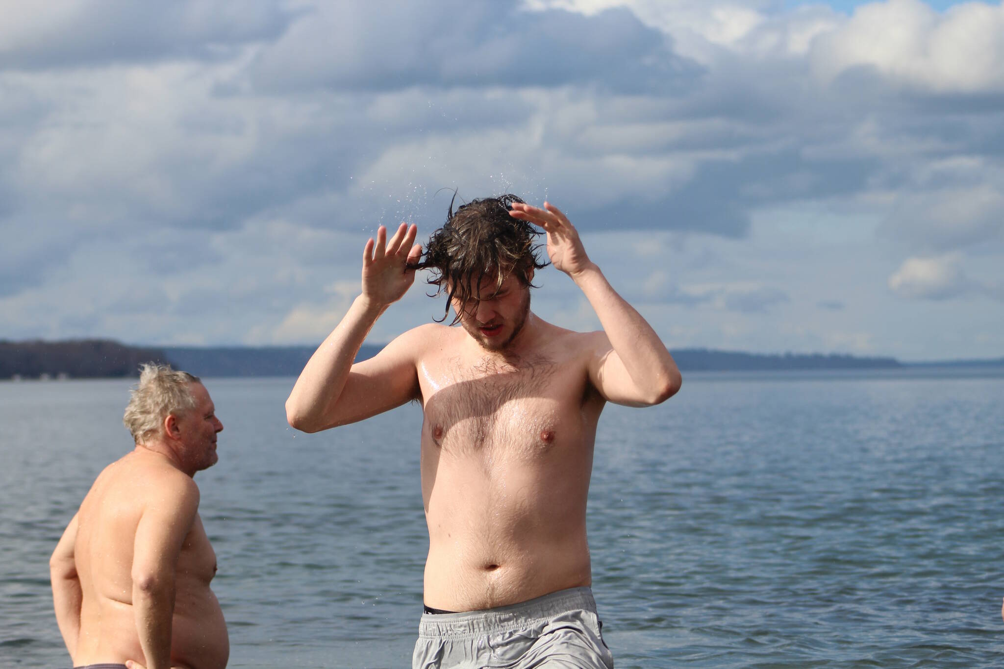More than a dozen people plunged into the chilly waters of the Puget Sound on Saturday, March 10, for the Marine Hills Swim and Tennis Club Polar Bear Plunge. Alex Bruell / The Mirror
