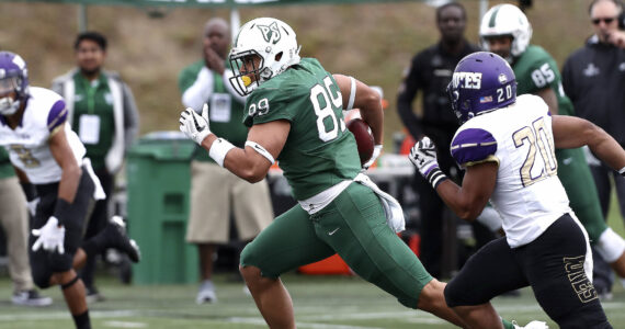 Charlie Taumoepeau, No. 89, outruns a defensive back in a home game while playing for Portland State. Photo courtesy of Larry Lawson