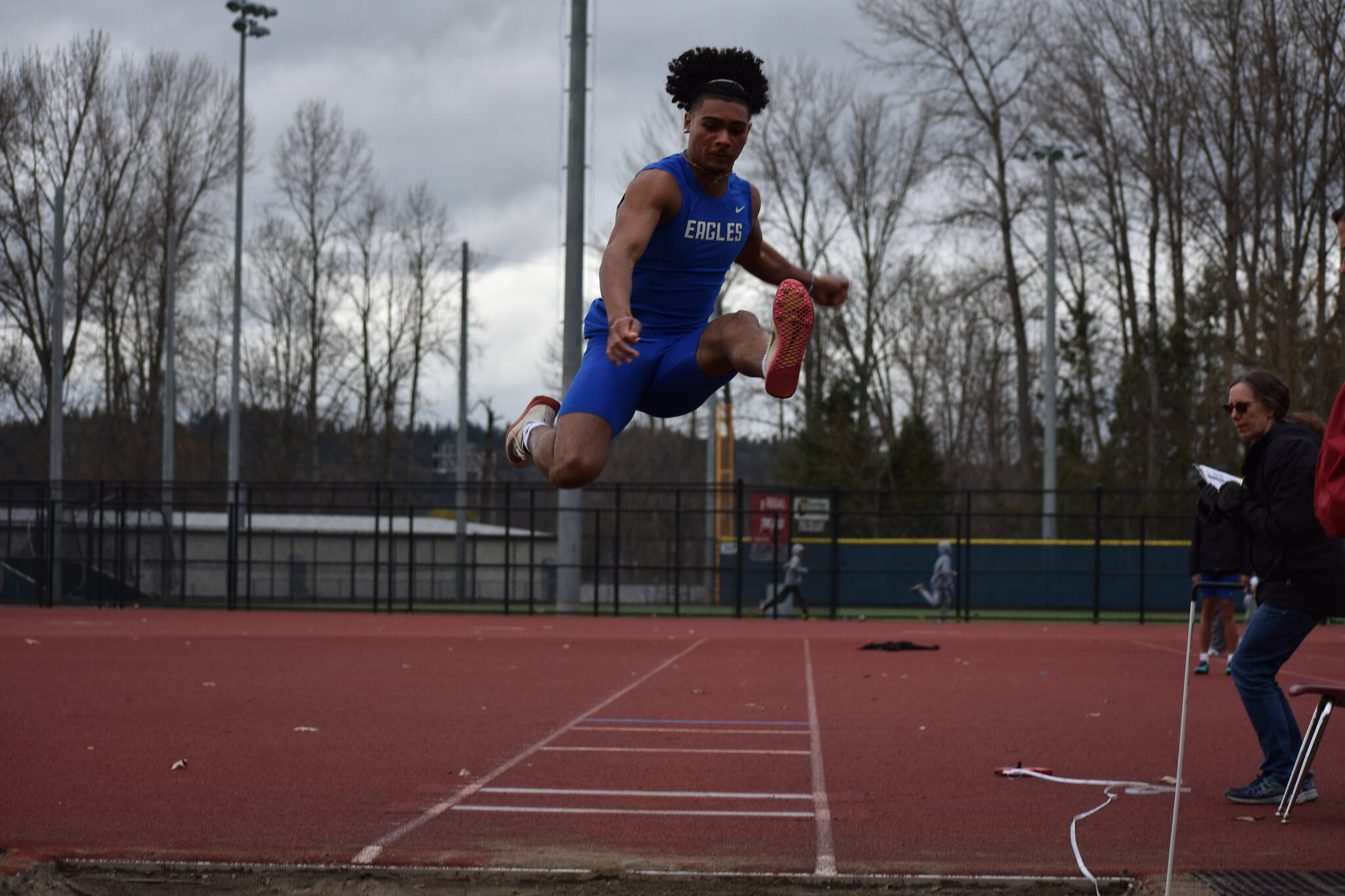 Eagle Julien Fortin takes flight during his long jump. Ben Ray / The Mirror