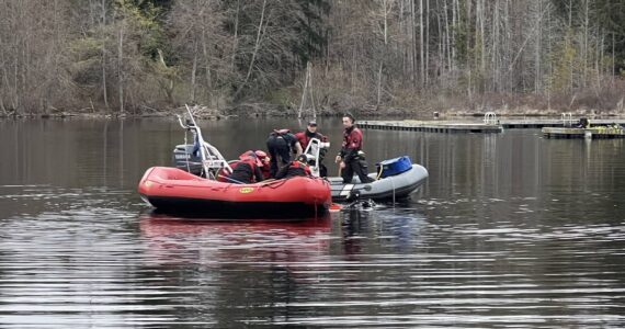 Rescue divers search Five Mile Lake in Auburn on April 5 for a fisherman who went into the water to help a kayaker. Photo courtesy of South King Fire and Rescue