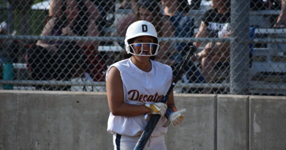 Kahea Sharpe gets fired up after scoring the first run in the Decatur game against Skyview. Ben Ray / The Mirror