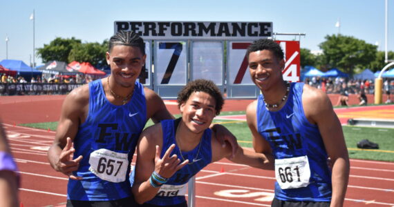 From right to left Julian Gene Fortin (3), Roman Hutchinson (1), Jaylon Jenkins (2) pose after sweeping the triple jump event.