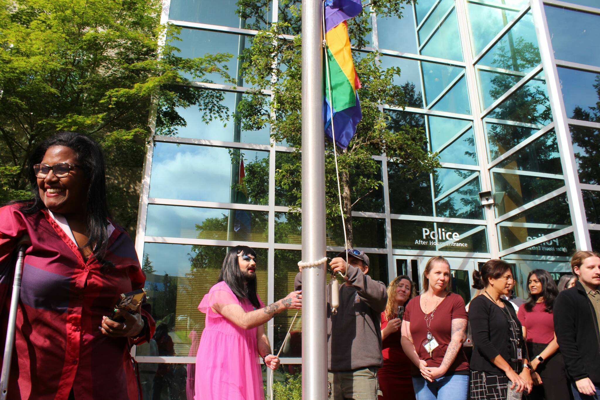 Drag queen Nemesis helps raise the pride flag June 1 at Federal Way City Hall. Alex Bruell / The Mirror