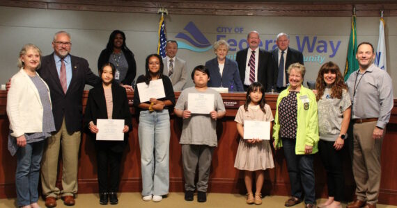 Alex Bruell / The Mirror 
The city council and city judges Dave Larson and Brad Bales on June 20 honored several local students for their submission to the Municipal Court Student Art Contest.