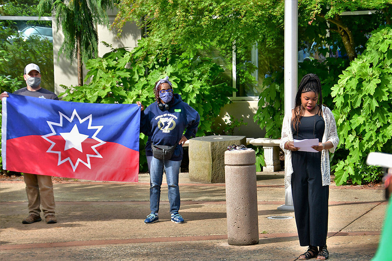 Photo by Bruce Honda. 
Anisah Rogers, at the 2020 Juneteenth flag raising in Federal Way.