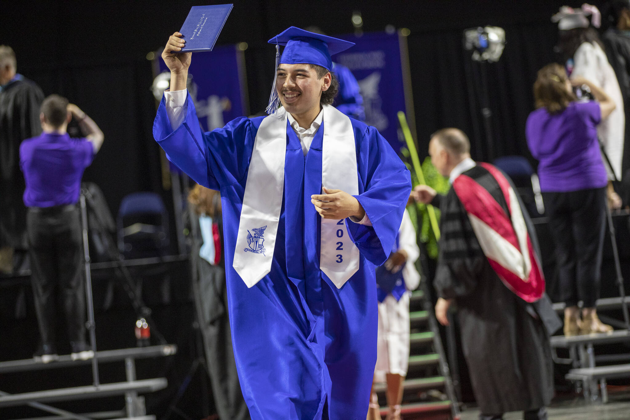Photo courtesy Federal Way School District. 
A Federal Way High School graduate shows off the diploma.