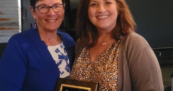 Courtesy photo
Cindy Ducich, multimedia sales manager for the Mirror, was named Rotarian of the Year by the Federal Way Rotary Club on June 15. This annual award is designated for the one Rotarian who clearly stands out in demonstrating “Service Above Self,” and principled commitment to the Rotary Four-Way Test. Pictured: Diane Lyons (right), president of the Rotary Club of Federal Way, presented Ducich (left) as the Rotarian of the Year.