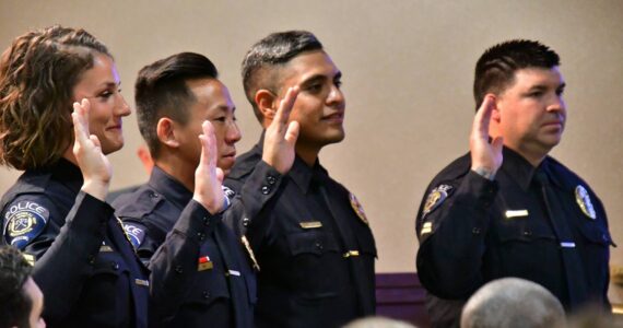Photo by Bruce Honda. 
From left to right: Corporals Hilary Mariani, Jae An, Ricardo Cuellar and Eric Reyna are sworn in during the July 5, 2023 city council meeting.