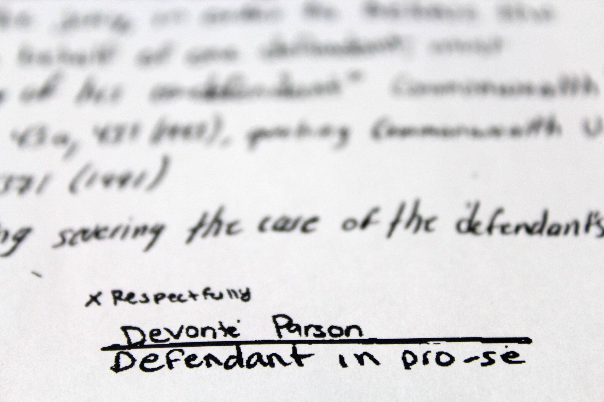 A printed court document from De’Vonte’ Parson’s 2015 assault case includes his signed signature. Photo by Alex Bruell / The Mirror
