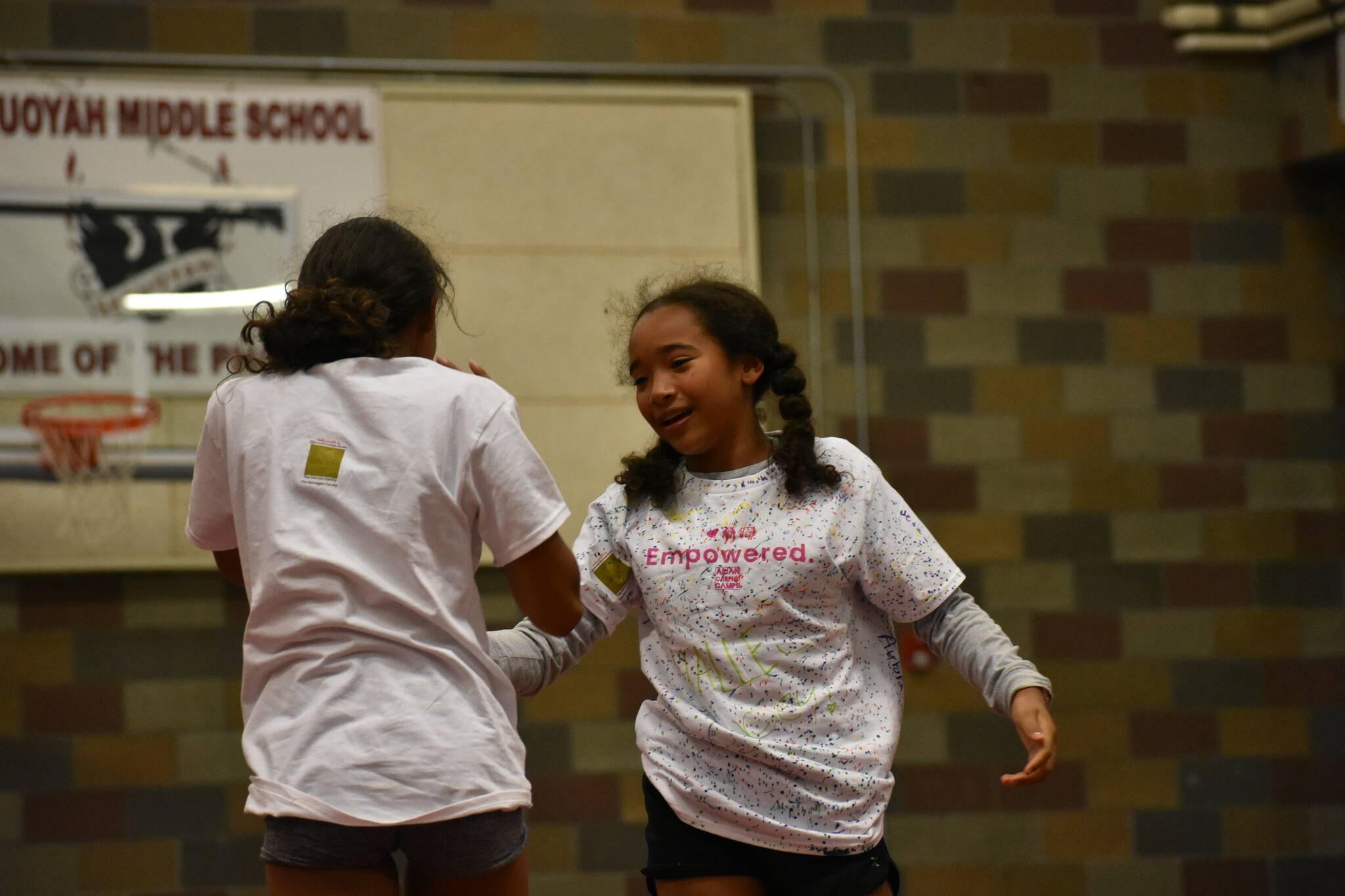Two campers laugh after their battle on the mat. (Photos by Ben Ray / The Mirror)
