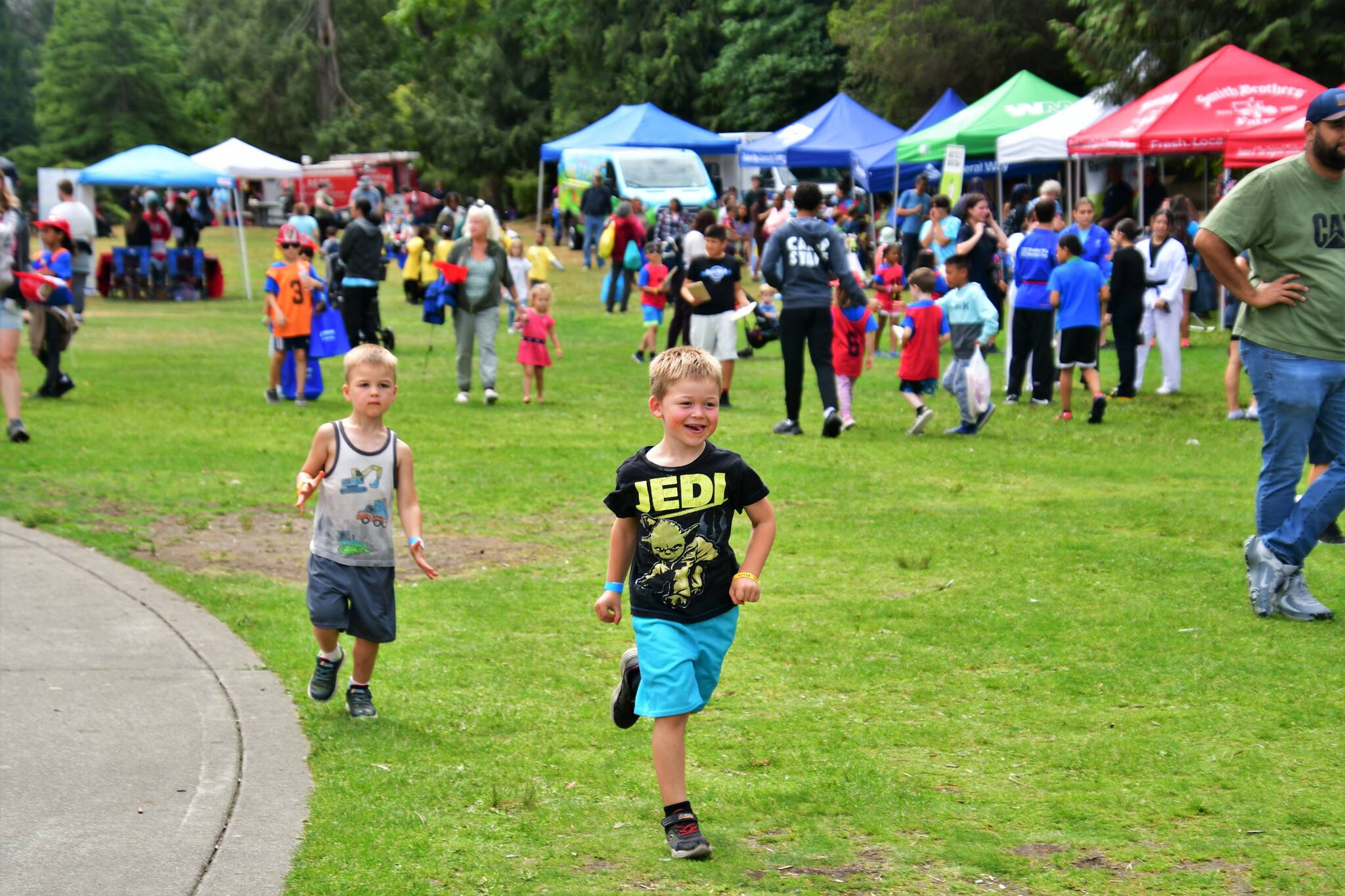 Steel Lake Park was packed with kids and families enjoying Kids’ Day on Aug. 9. Photos courtesy Bruce Honda.
 .
 .
 .