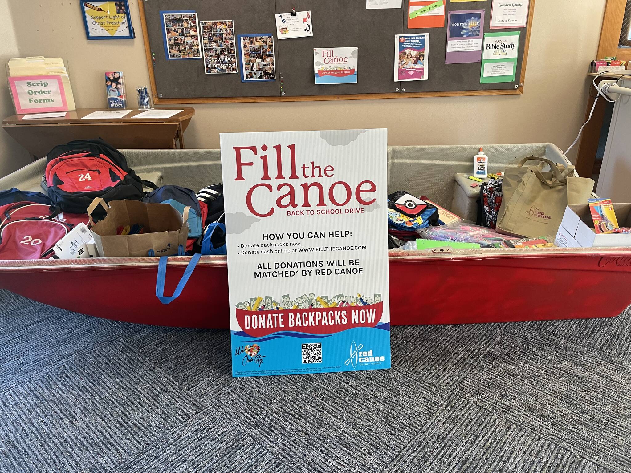 Donations left at one of the drop off locations of the Red Canoe school supply drive. Photo by Shelley Pauls / We Love Our City