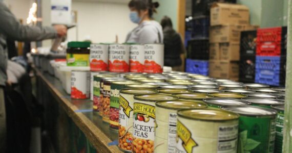 Volunteers and staff at the Multi-Service Center food bank. (Mirror file photo)