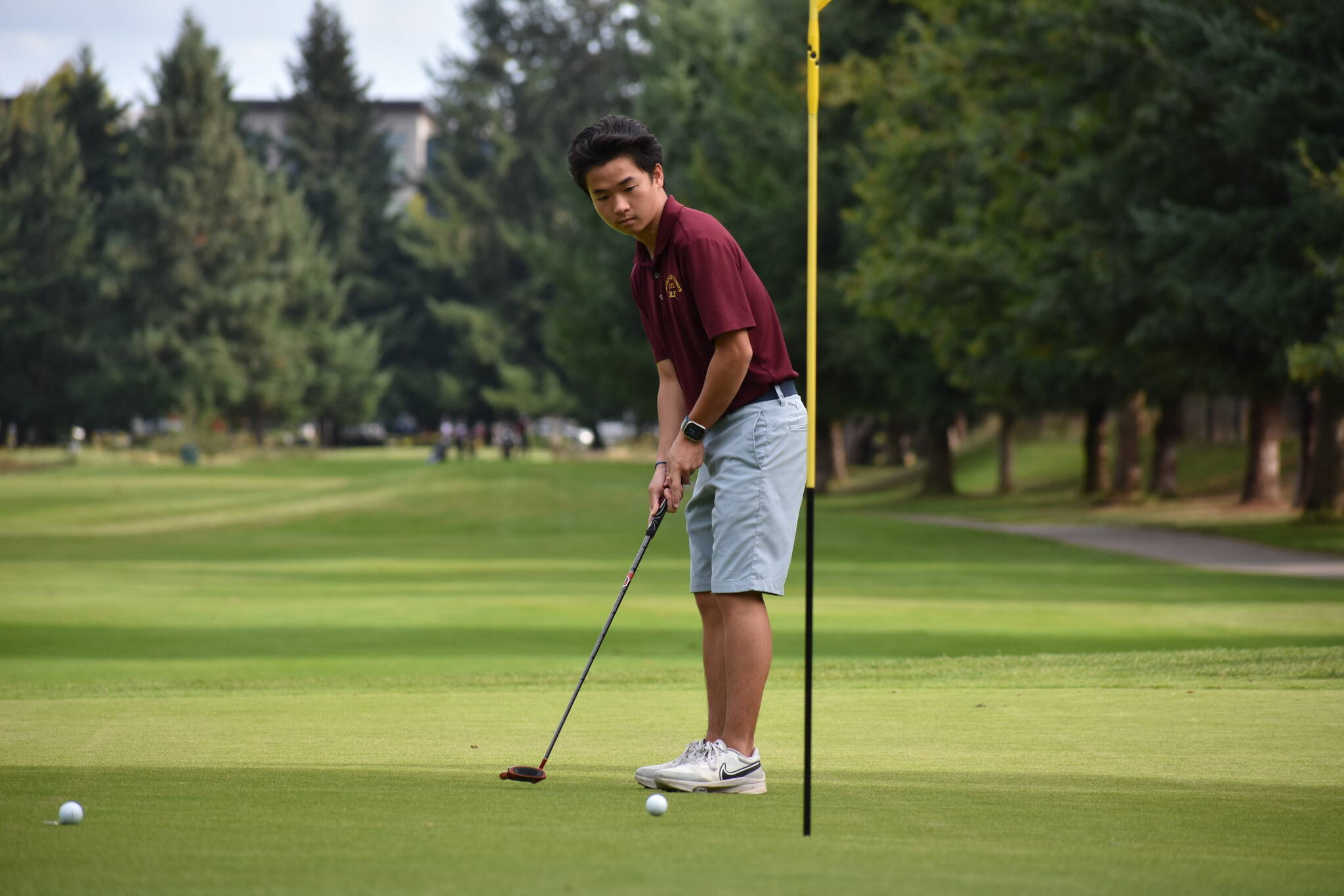 Brandon Bao sinks a six-footer on the fourth hole. Ben Ray / The Mirror