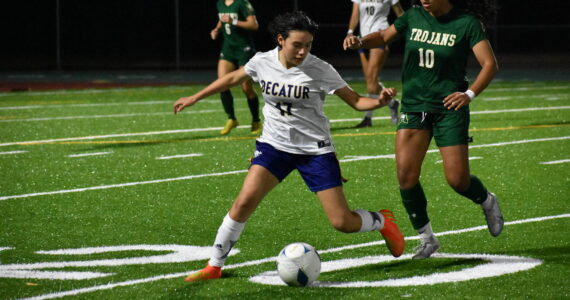 (10) Samantha Tovar controls the ball in the first half of Decatur’s 8-2 win. Ben Ray / The Mirror