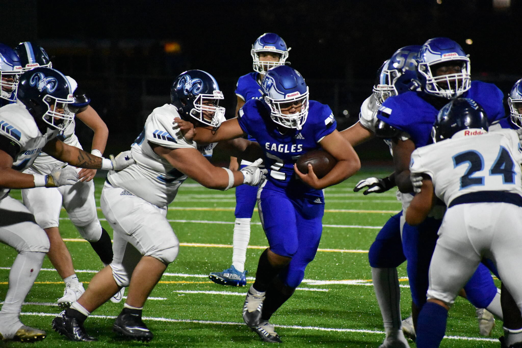 Junior Sione Kongaika pushes off a defender. Ben Ray / The Mirror