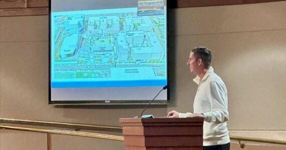Principal of OneTrent Development Trent Mummery answers questions about the Town Center 3 development project at the special council session on Nov. 9. (Photo provided by City of Federal Way)