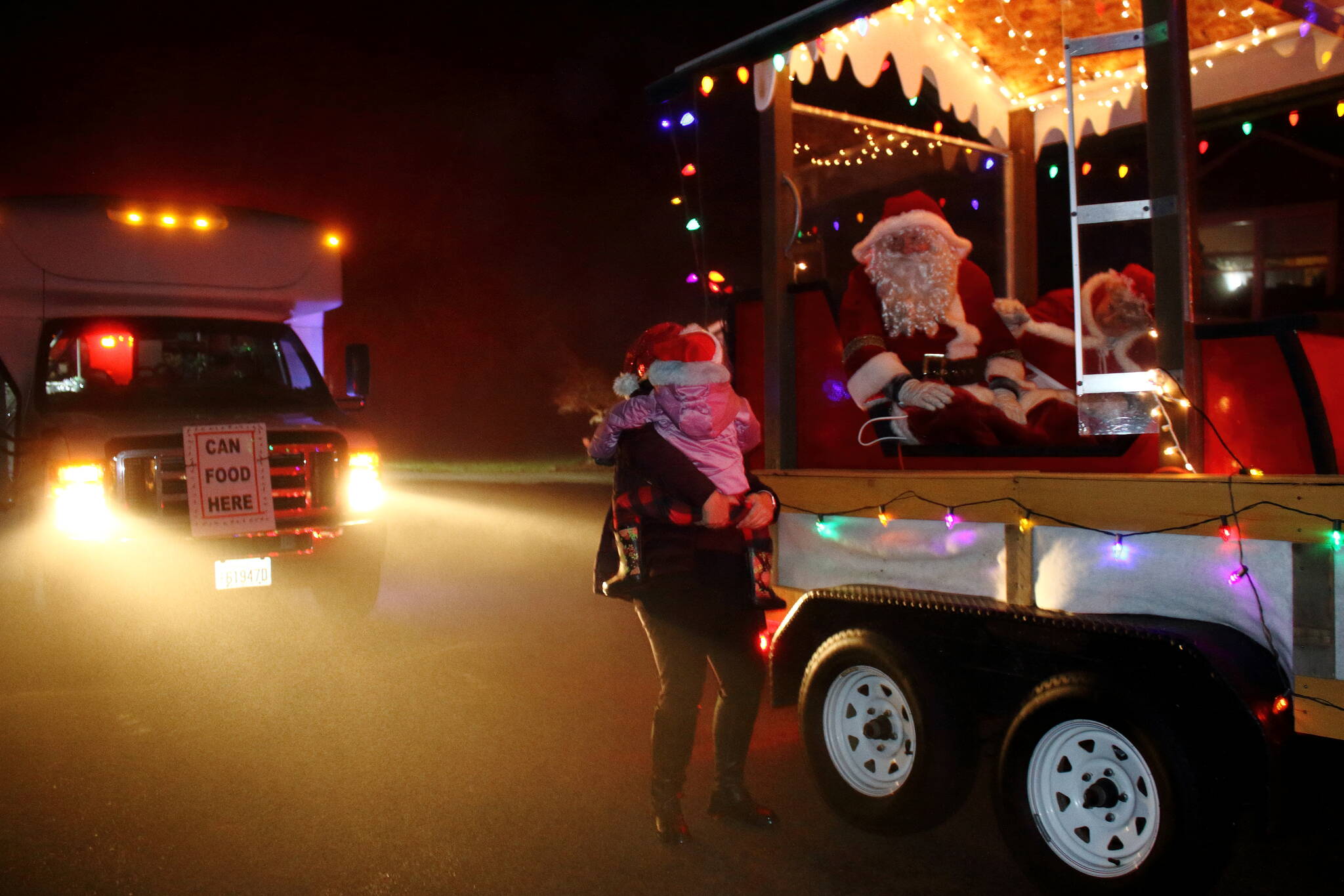 Families enjoyed meeting Santa during the parade on Dec. 12. Photo by Keelin Everly-Lang / The Mirror
