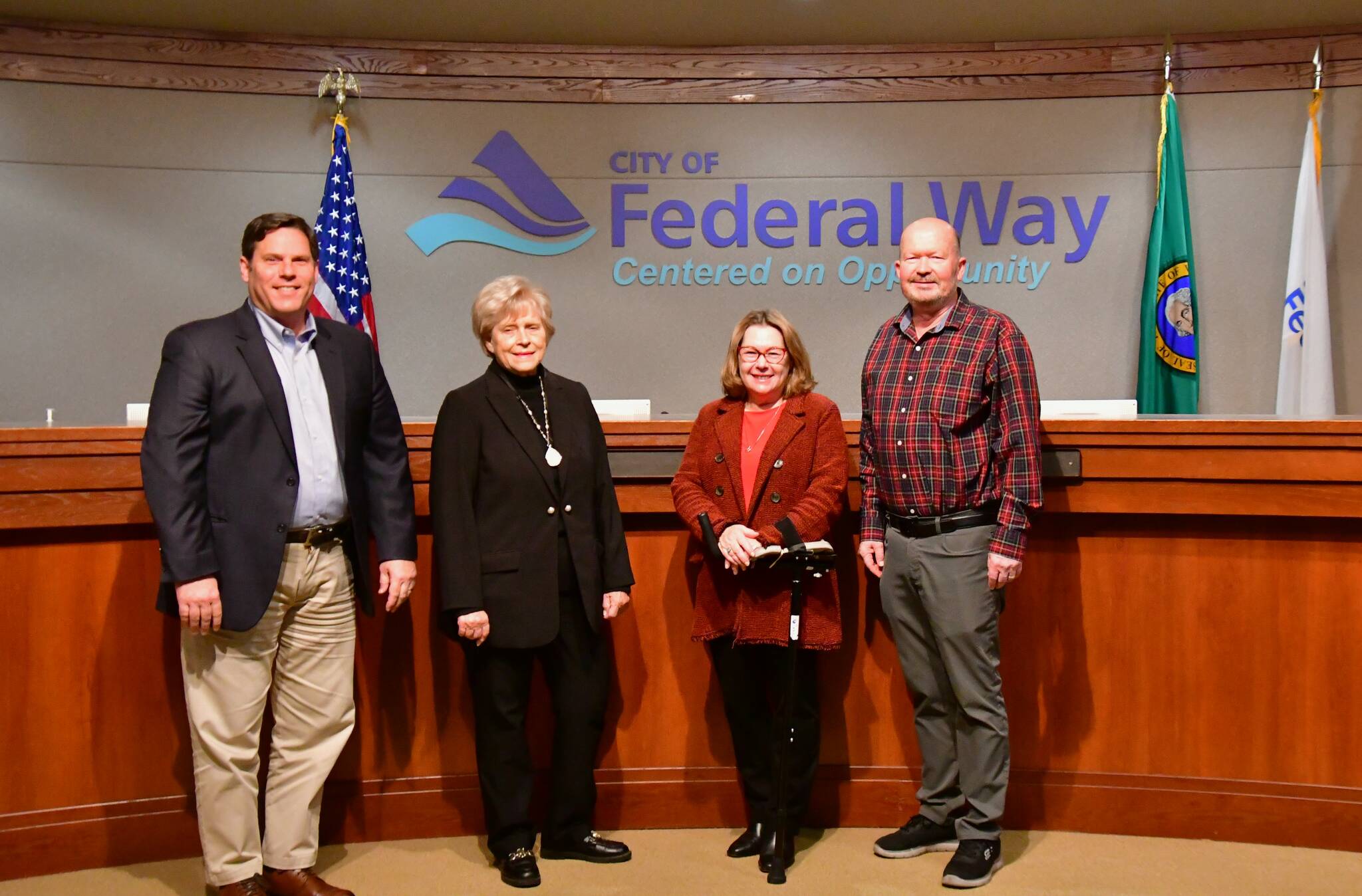 hoto by Bruce Honda
Mayor Jim Ferrell poses with Linda Kochmar, Susan Honda and Jack Walsh, who were all re-elected to their previous positions on the Federal Way City Council in November 2023. P