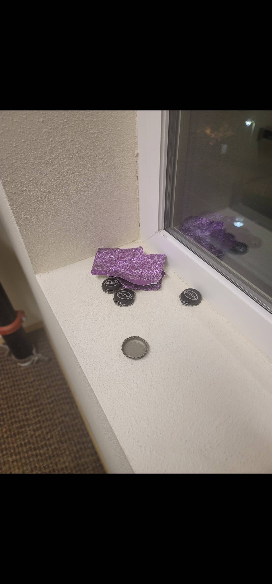 Bottle caps and other drug-related trash was left behind by an intruder into the apartment building. Photo provided by SHAG resident Frank Fields